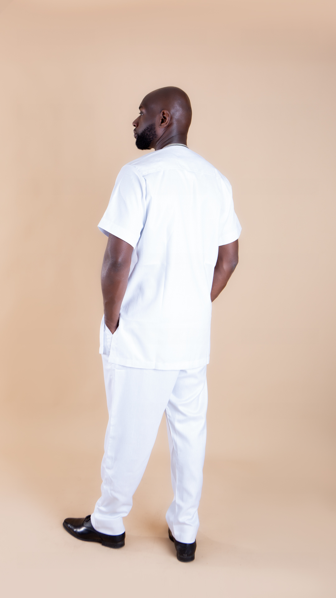 Beautiful Black Button White Polish African Suit Set - Image 3