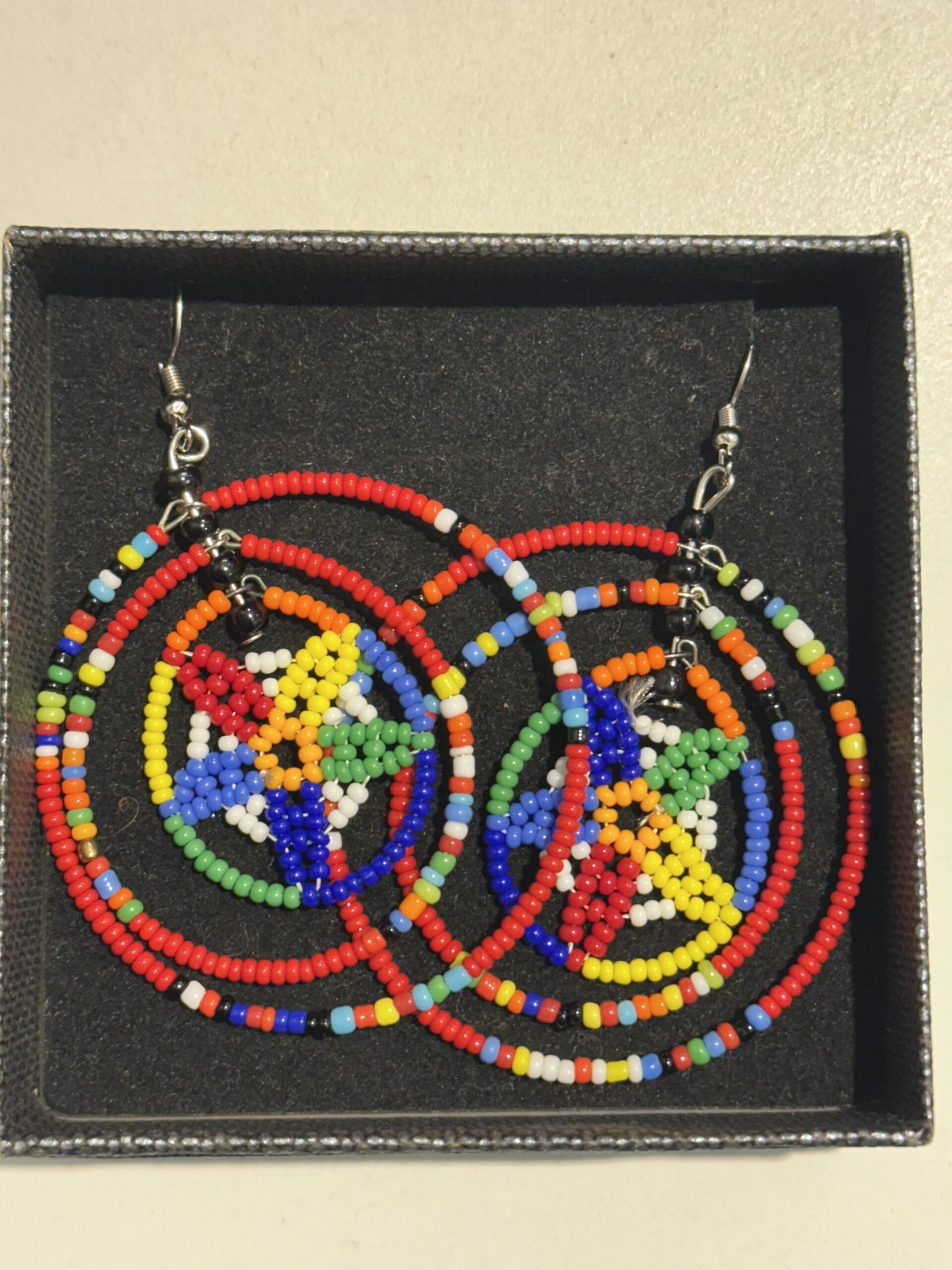 Handmade Multi-Coloured Circular Kenyan Beaded Earrings - Image 2
